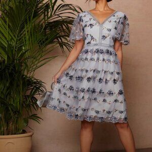 Chi Chi London Size 8 blue in color with floral print, wedding guest ready